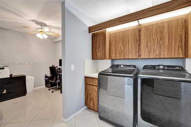 Move-in ready top-floor 2-bedroom, 2-bath condo with no on Pine Island Ridge Country Club in Florida - for sale on GolfHomes.com, golf home, golf lot