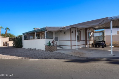 Prime Island Location! This beautifully maintained 3-bedroom on London Bridge Golf Course in Arizona - for sale on GolfHomes.com, golf home, golf lot