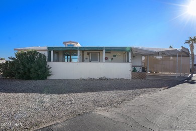 Prime Island Location! This beautifully maintained 3-bedroom on London Bridge Golf Course in Arizona - for sale on GolfHomes.com, golf home, golf lot
