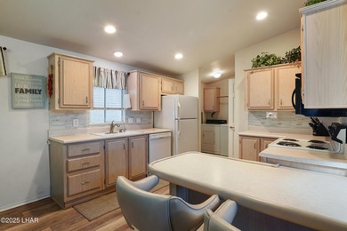 Prime Island Location! This beautifully maintained 3-bedroom on London Bridge Golf Course in Arizona - for sale on GolfHomes.com, golf home, golf lot