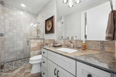 A custom home with panoramic Intracoastal views behind the gates on Queens Harbour Yacht and Country Club in Florida - for sale on GolfHomes.com, golf home, golf lot
