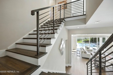 A custom home with panoramic Intracoastal views behind the gates on Queens Harbour Yacht and Country Club in Florida - for sale on GolfHomes.com, golf home, golf lot