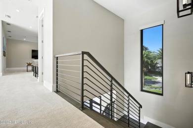 A custom home with panoramic Intracoastal views behind the gates on Queens Harbour Yacht and Country Club in Florida - for sale on GolfHomes.com, golf home, golf lot