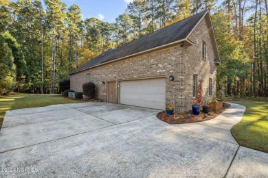 Discover stress-free coastal living in this beautiful 4BR 3BA on Cypress Landing Golf Club in North Carolina - for sale on GolfHomes.com, golf home, golf lot