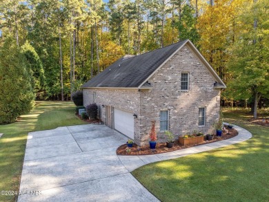 Discover stress-free coastal living in this beautiful 4BR 3BA on Cypress Landing Golf Club in North Carolina - for sale on GolfHomes.com, golf home, golf lot