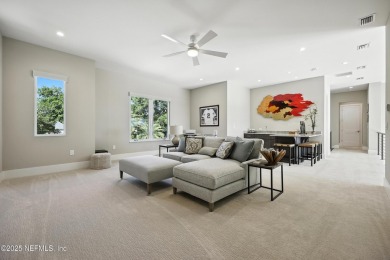 A custom home with panoramic Intracoastal views behind the gates on Queens Harbour Yacht and Country Club in Florida - for sale on GolfHomes.com, golf home, golf lot