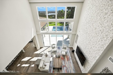 A custom home with panoramic Intracoastal views behind the gates on Queens Harbour Yacht and Country Club in Florida - for sale on GolfHomes.com, golf home, golf lot