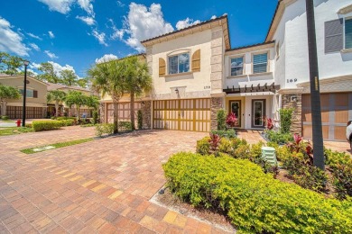 Welcome home to Binks Pointe, a gated enclave of stylish on Binks Forest Golf Club in Florida - for sale on GolfHomes.com, golf home, golf lot