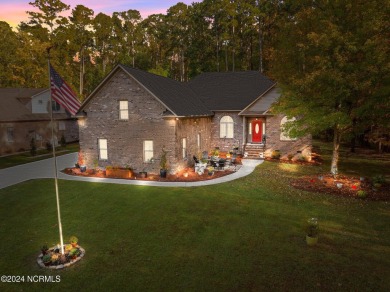 Discover stress-free coastal living in this beautiful 4BR 3BA on Cypress Landing Golf Club in North Carolina - for sale on GolfHomes.com, golf home, golf lot