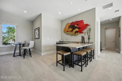 A custom home with panoramic Intracoastal views behind the gates on Queens Harbour Yacht and Country Club in Florida - for sale on GolfHomes.com, golf home, golf lot