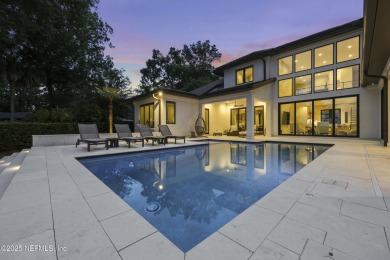 A custom home with panoramic Intracoastal views behind the gates on Queens Harbour Yacht and Country Club in Florida - for sale on GolfHomes.com, golf home, golf lot