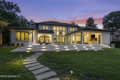 A custom home with panoramic Intracoastal views behind the gates on Queens Harbour Yacht and Country Club in Florida - for sale on GolfHomes.com, golf home, golf lot