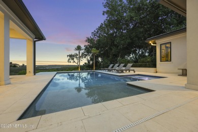 A custom home with panoramic Intracoastal views behind the gates on Queens Harbour Yacht and Country Club in Florida - for sale on GolfHomes.com, golf home, golf lot