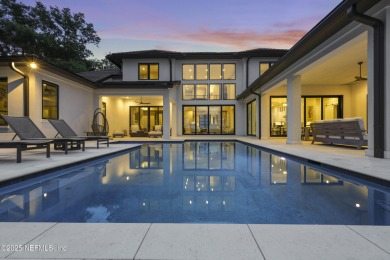 A custom home with panoramic Intracoastal views behind the gates on Queens Harbour Yacht and Country Club in Florida - for sale on GolfHomes.com, golf home, golf lot