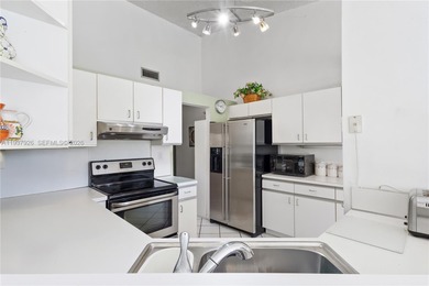 BEAUTIFULLY MAINTAINED ONE-STORY CORNER TOWNHOME OFFERING SERENE on Costa Greens Golf Club in Florida - for sale on GolfHomes.com, golf home, golf lot