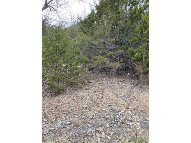 Building lot with a lot of potential.  Close to amenities on Holiday Island Executive Golf Course in Arkansas - for sale on GolfHomes.com, golf home, golf lot