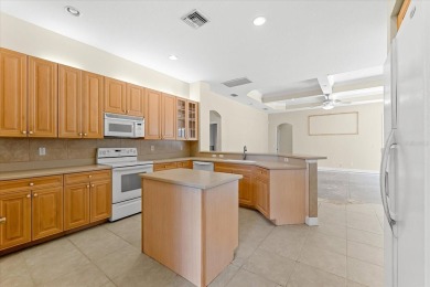 Investor Special - Spacious 4-Bedroom Home in the  Premier Gated on Riverwood Golf Club in Florida - for sale on GolfHomes.com, golf home, golf lot