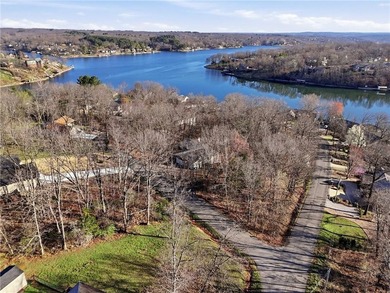 Enjoy a lake view setting paired with a flexible floor plan full on Bella Vista Country Club - Scottsdale in Arkansas - for sale on GolfHomes.com, golf home, golf lot
