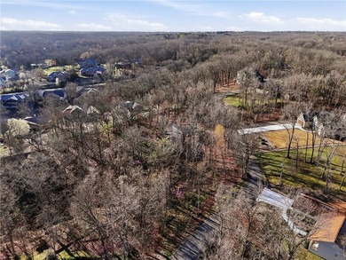 Enjoy a lake view setting paired with a flexible floor plan full on Bella Vista Country Club - Scottsdale in Arkansas - for sale on GolfHomes.com, golf home, golf lot