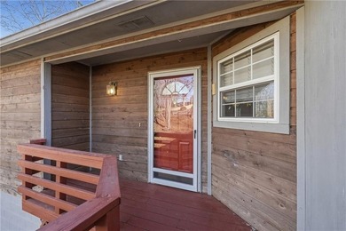 Enjoy a lake view setting paired with a flexible floor plan full on Bella Vista Country Club - Scottsdale in Arkansas - for sale on GolfHomes.com, golf home, golf lot