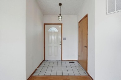 Enjoy a lake view setting paired with a flexible floor plan full on Bella Vista Country Club - Scottsdale in Arkansas - for sale on GolfHomes.com, golf home, golf lot