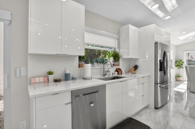 This stunning 3-bedroom, 2-bath waterfront home has it on Boca Raton Municipal Golf Course in Florida - for sale on GolfHomes.com, golf home, golf lot