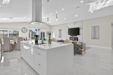 This stunning 3-bedroom, 2-bath waterfront home has it on Boca Raton Municipal Golf Course in Florida - for sale on GolfHomes.com, golf home, golf lot