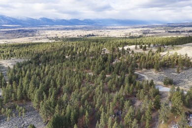 Discover the pinnacle of luxury living in this serene mountain on Stock Farm Club in Montana - for sale on GolfHomes.com, golf home, golf lot