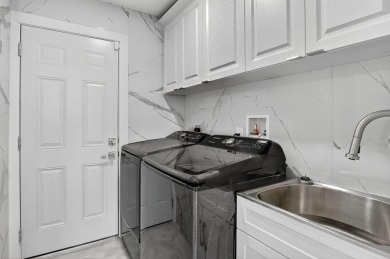 This stunning 3-bedroom, 2-bath waterfront home has it on Boca Raton Municipal Golf Course in Florida - for sale on GolfHomes.com, golf home, golf lot