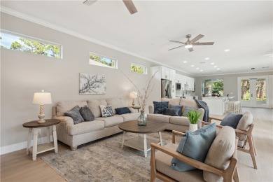 Nestled on a quiet, tree-lined street, this home has been nicely on Indian River Club in Florida - for sale on GolfHomes.com, golf home, golf lot