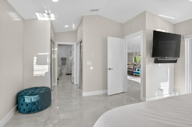 This stunning 3-bedroom, 2-bath waterfront home has it on Boca Raton Municipal Golf Course in Florida - for sale on GolfHomes.com, golf home, golf lot
