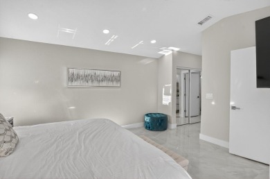 This stunning 3-bedroom, 2-bath waterfront home has it on Boca Raton Municipal Golf Course in Florida - for sale on GolfHomes.com, golf home, golf lot