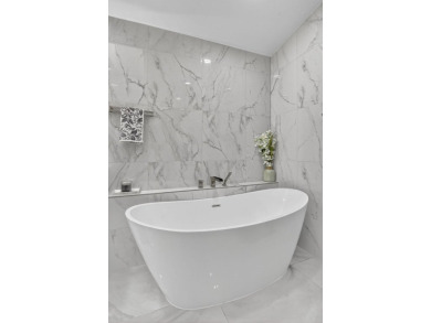 This stunning 3-bedroom, 2-bath waterfront home has it on Boca Raton Municipal Golf Course in Florida - for sale on GolfHomes.com, golf home, golf lot