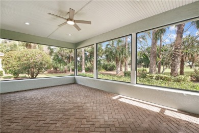 Nestled on a quiet, tree-lined street, this home has been nicely on Indian River Club in Florida - for sale on GolfHomes.com, golf home, golf lot