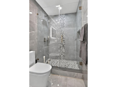 This stunning 3-bedroom, 2-bath waterfront home has it on Boca Raton Municipal Golf Course in Florida - for sale on GolfHomes.com, golf home, golf lot