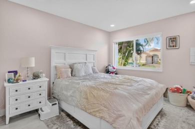This stunning 3-bedroom, 2-bath waterfront home has it on Boca Raton Municipal Golf Course in Florida - for sale on GolfHomes.com, golf home, golf lot