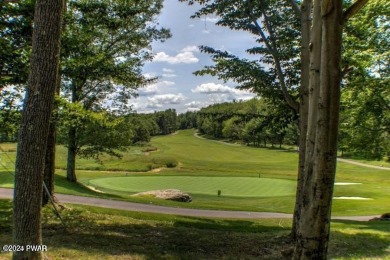 Time to cozy up....nestled in the trees find this 3 bedroom home on The Hideout Golf in Pennsylvania - for sale on GolfHomes.com, golf home, golf lot