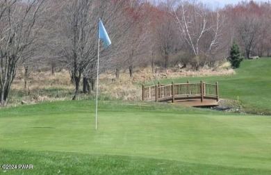 Time to cozy up....nestled in the trees find this 3 bedroom home on The Hideout Golf in Pennsylvania - for sale on GolfHomes.com, golf home, golf lot