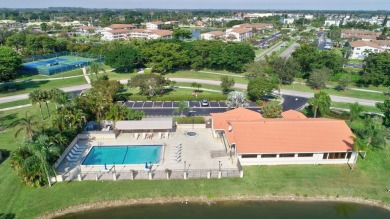 This stunning 3-bedroom, 2-bath waterfront home has it on Boca Raton Municipal Golf Course in Florida - for sale on GolfHomes.com, golf home, golf lot