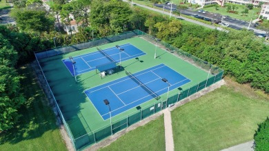 This stunning 3-bedroom, 2-bath waterfront home has it on Boca Raton Municipal Golf Course in Florida - for sale on GolfHomes.com, golf home, golf lot