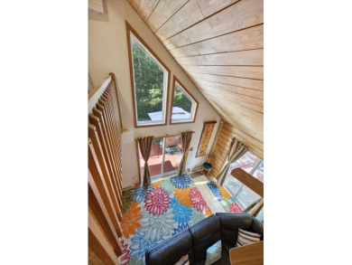 Discover your dream lakeside escape with this stunning Pocono on Pinecrest Lake Golf and Country Club in Pennsylvania - for sale on GolfHomes.com, golf home, golf lot