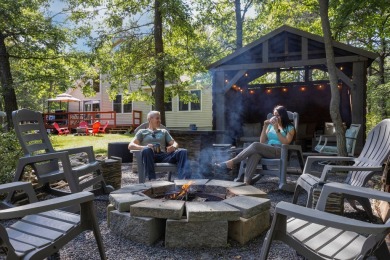 Discover your dream lakeside escape with this stunning Pocono on Pinecrest Lake Golf and Country Club in Pennsylvania - for sale on GolfHomes.com, golf home, golf lot