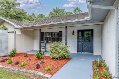 BEAUTIFUL SPACIOUS POOL HOME! This 4 bedroom 2 1/2 baths & 2 car on Sugarmill Woods Golf and Country Club in Florida - for sale on GolfHomes.com, golf home, golf lot