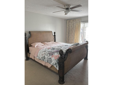 Beautiful view from balcony of golf course and water this 2/2 is on Poinciana Golf Club in Florida - for sale on GolfHomes.com, golf home, golf lot