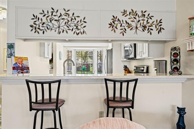 PENDING.  A MUST SEE!  Impeccably maintained, UPDATED, End unit on Timber Pines Golf Course in Florida - for sale on GolfHomes.com, golf home, golf lot