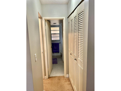 Beautiful view from balcony of golf course and water this 2/2 is on Poinciana Golf Club in Florida - for sale on GolfHomes.com, golf home, golf lot