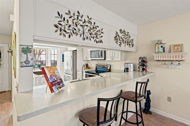 PENDING.  A MUST SEE!  Impeccably maintained, UPDATED, End unit on Timber Pines Golf Course in Florida - for sale on GolfHomes.com, golf home, golf lot