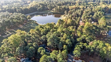 Golf front lot located on the fairway of the 11th hole of the 7 on Seven Lakes Country Club in North Carolina - for sale on GolfHomes.com, golf home, golf lot