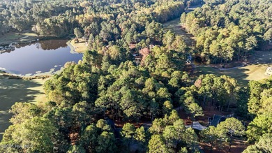 Golf front lot located on the fairway of the 11th hole of the 7 on Seven Lakes Country Club in North Carolina - for sale on GolfHomes.com, golf home, golf lot