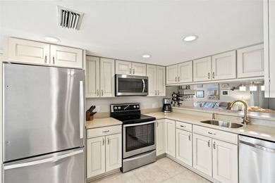 PENDING.  A MUST SEE!  Impeccably maintained, UPDATED, End unit on Timber Pines Golf Course in Florida - for sale on GolfHomes.com, golf home, golf lot